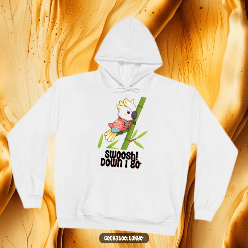Funny Kawaii Cockatoo Hoodie: A vibrant bird in a kimono slides bamboo, offering warmth and a dose of humor.